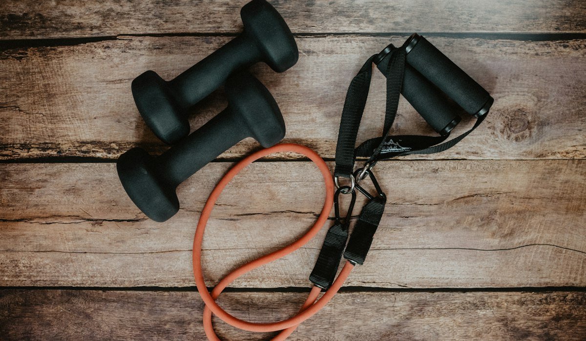 Person doing strength training with dumbbells